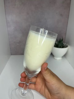 mint candle with glass carving on it